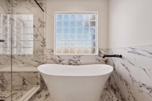 Fort Collins Bath Renovation Tub and glass brick